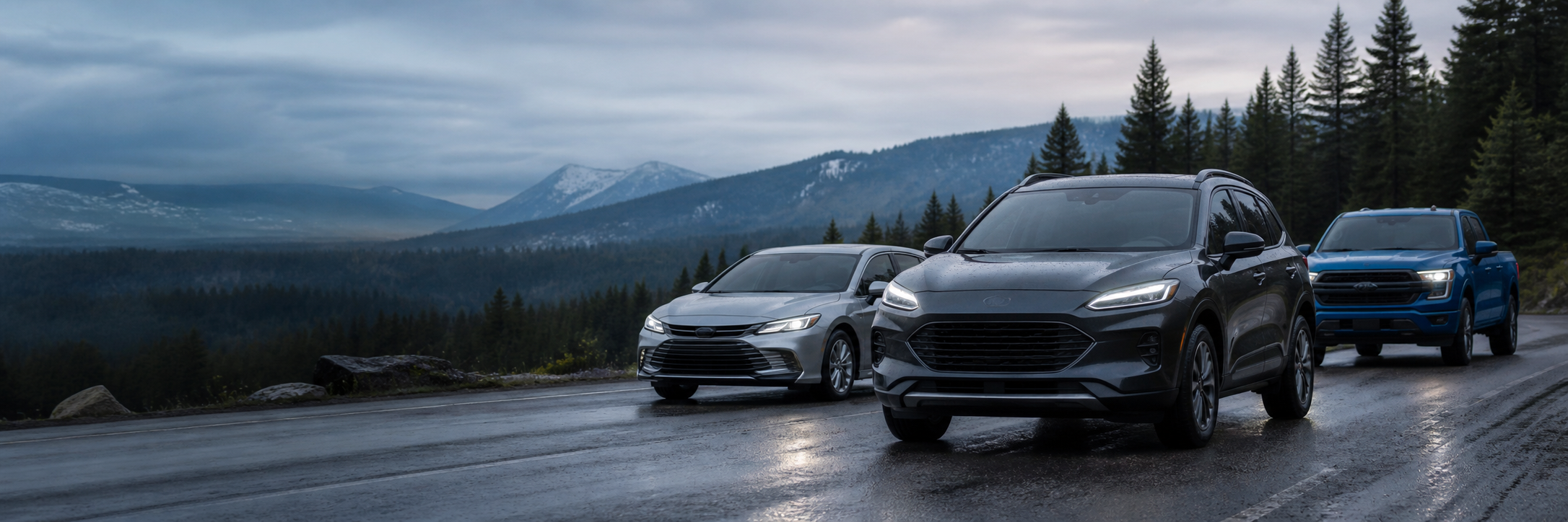 Pre-owned vehicles on a Pacific Northwest mountain road
